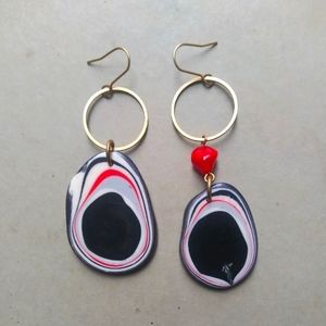 'Modern Industrial Asymmetry' Dangles